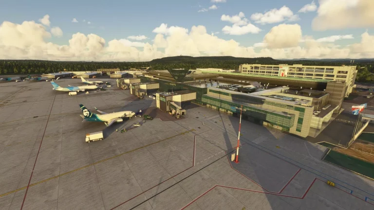 Aerial view of EPKK Krakow airport terminal and apron with parked aircraft in Microsoft Flight Simulator 2024