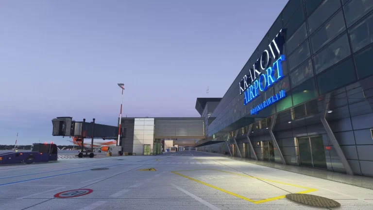 EPKK Krakow airport terminal glass facade with Kraków Airport sign at dusk in Microsoft Flight Simulator 2024